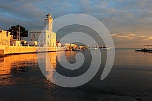 Lighthouse and harbour of Manfredonia (Puglia, Italy) at sunset