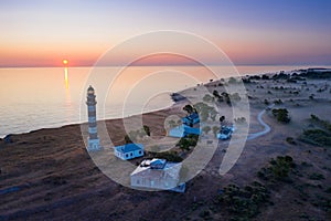 Lighthouse and hause on the small island in the Baltic Sea. Architecture on the Osmussaar