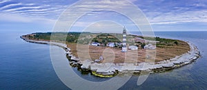 Lighthouse and hause on the small island in the Baltic Sea. Architecture on the Osmussaar