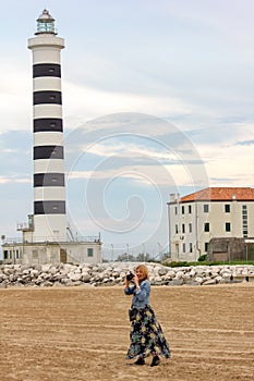 a lighthouse that helps sailors find their way at night. always romantic images.