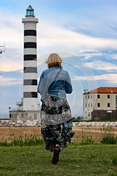 a lighthouse that helps sailors find their way at night. always romantic images.