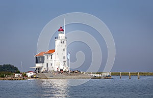Lighthouse `The Horse of Marken` aka as `The horse of Marken` seen from the Markermeer