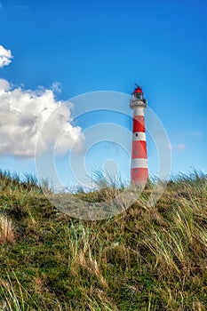 Lighthouse on island of Ameland with blue sky, The Netherlands