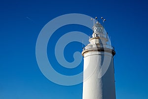 Lighthouse La Farola de Malaga in Malaga city. Andalusia, Costa del sol, Spain photo