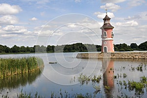 Lighthouse in a lake photo