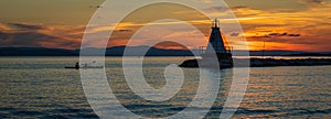 Lighthouse on Lake Champlain at sunset