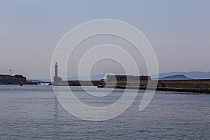 Lighthouse landmark in a pier in Chania, Crete, Greek Island, Mediterranean Sea