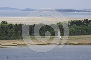 Lighthouse in landscape at the Baltic Sea shore