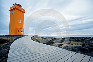 Lighthouse in lava field in beautiful nature in Snaefellsjokull National Park in Iceland, autumntime