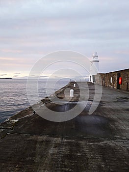 lighthouse and dramatic sky ahead