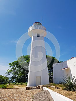 Lighthouse located in the highest part of the island of La Roqueta in Acapulco photo