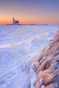 Lighthouse of Marken, The Netherlands at sunrise in winter