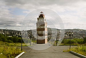 Lighthouse And Murmansk City