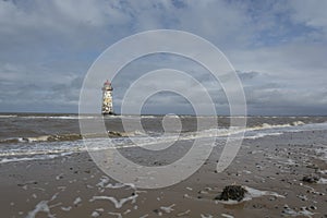 The lighthouse on the nearby beach and the Talacre Beach