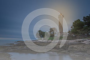 Lighthouse in the night in Savudrija, Croatia.