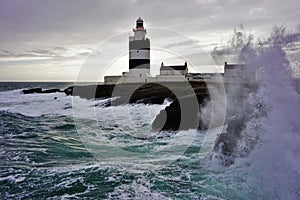 Lighthouse by the ocean