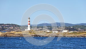 Lighthouse OksÃ¸y fyr south of Kristiansand in Norway