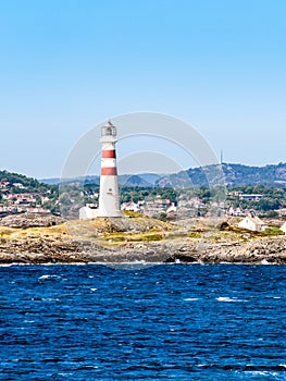 Lighthouse OksÃ¸y fyr south of Kristiansand in Norway