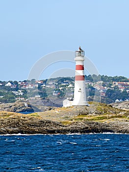 Lighthouse OksÃ¸y fyr south of Kristiansand in Norway