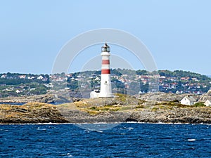 Lighthouse OksÃ¸y fyr south of Kristiansand in Norway