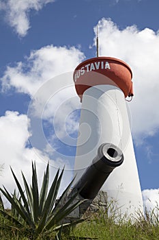 Lighthouse and old cannon on top of Gustavia Harbor, St Barts, French West Indies