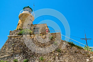 Lighthouse of Old Fortress in Kerkyra, Corfu Town in Greece.