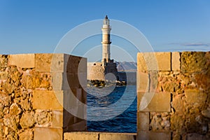Lighthouse and old Venetian port of Chania, Crete in the late evening sun