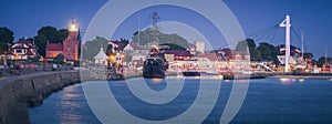 Lighthouse and pedestrian bridge in Ustka photo