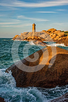 Lighthouse of Ploumanach at the golden hour in Perros-Guirec, Côtes d\'Armor, Brittany, France.