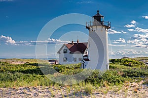 Lighthouse Point on beach dunes.