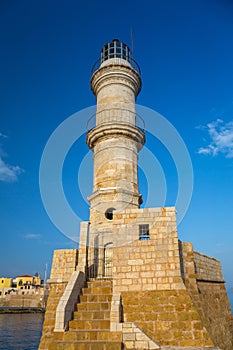 Lighthouse in the port of Chania at sunrise on Crete, Greece