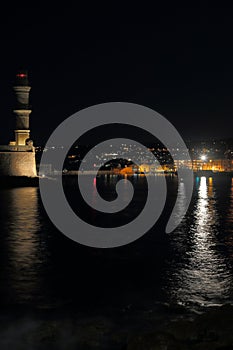 Lighthouse, port and the city of Chania