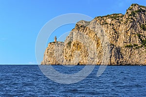 The lighthouse at Punta Carena warns seafarers off the island of Capri, Italy