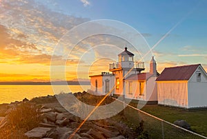 A lighthouse reflecting the sunset