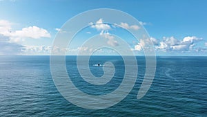 A lighthouse rising out of the ocean. Fastnet lighthouse