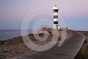 Lighthouse on the rock. sea Ã¢â‚¬â€¹Ã¢â‚¬â€¹lighthouse. way to the lighthouse