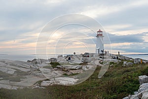 A lighthouse on a rocky out crop