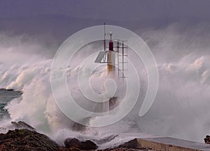 Lighthouse in the rough sea