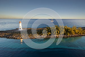 Lighthouse and sail ship at the tip of Paradise Island in Nassau, Bahamas