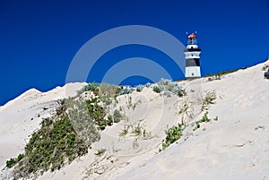 Lighthouse on sand dune