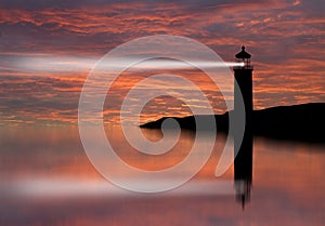 Lighthouse searchlight beam through marine air at night. photo