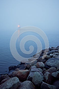 Lighthouse and seashore rocks in Aarhus