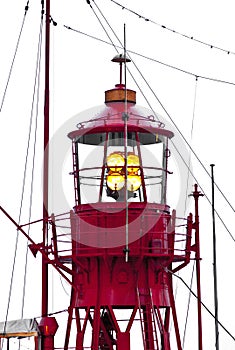 Lighthouse ship in harbor
