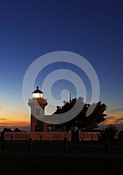 Lighthouse Silhouette at the golden magic hour at sunset