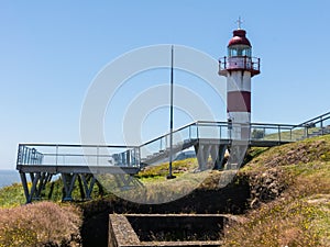 Lighthouse in the Spanish fortress in Niebla, Valdivia, Patagonia, Chile photo