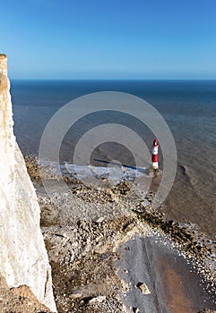 Lighthouse and steep chalk cliffs at Beachy Head