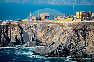 Lighthouse on the Stone Rocks of the Pacific Ocean Coastline near Vina del Mar, Chile