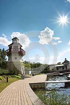 Lighthouse and sun