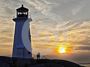 The LIGHTHOUSE at sunset, August 2023 at Peggys Cove Lighthouse