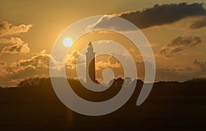 Lighthouse during sunset backlight